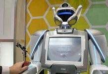 NEC розробила андроїда для прийому платежів